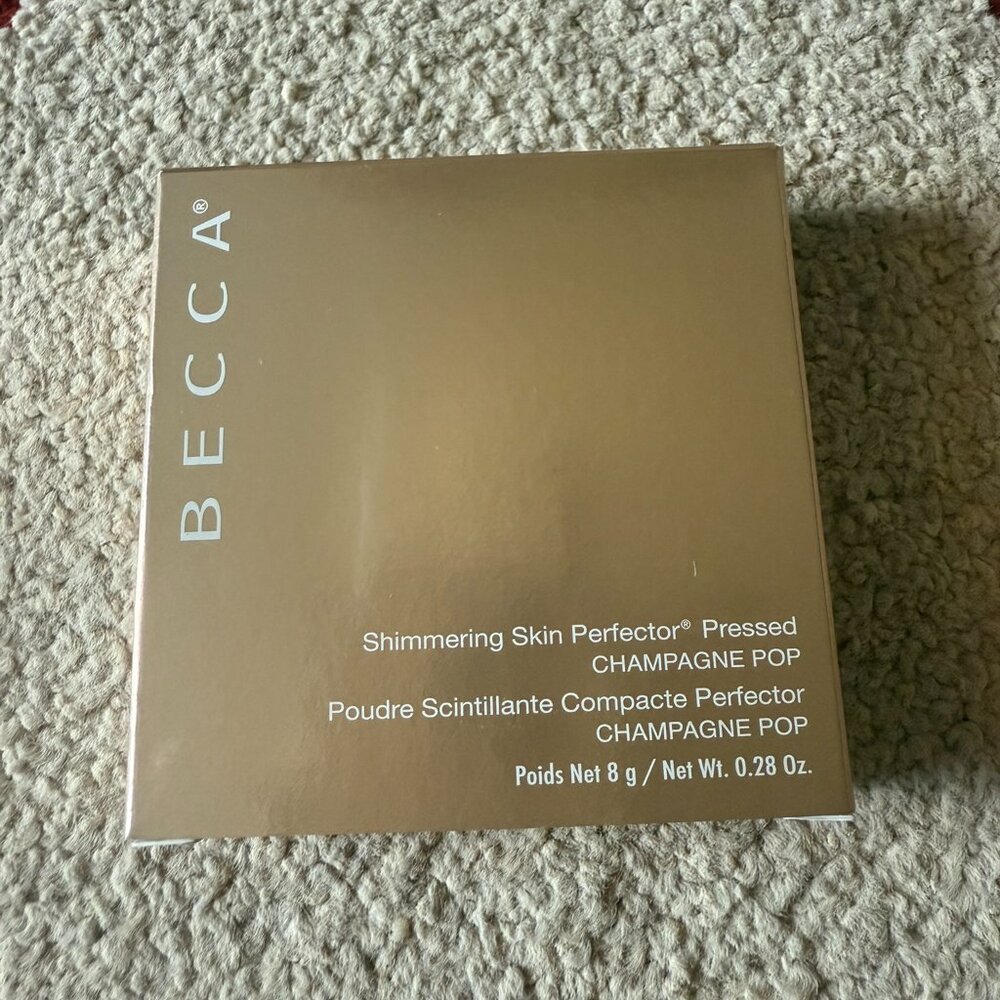 Becca Shimmering Skin Perfector Pressed in shade "Champagne Pop"
